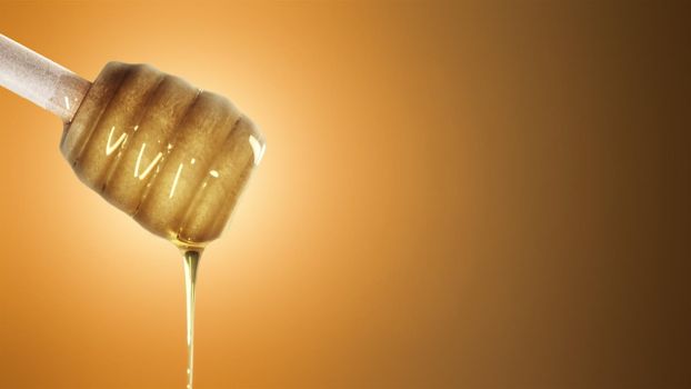 Honey dripping from honey dipper on orangel background 4k