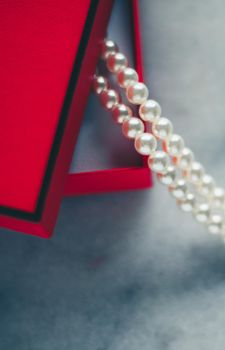 wonderful pearls in a red gift box, luxe present - jewellery and luxury gift for her styled concept, elegant visuals