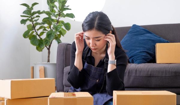 Asia people young woman thoughtful looking away doubtful stress worry in bad news