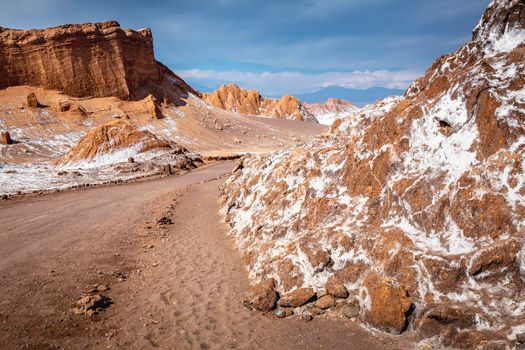 Dirt salt road in Atacama desert, moon valley arid landscape in Chile, South America