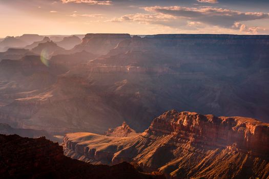 Grand Canyon south rim silhouette at golden sunset, Arizona, United States