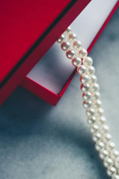 wonderful pearls in a red gift box, luxe present - jewellery and luxury gift for her styled concept, elegant visuals