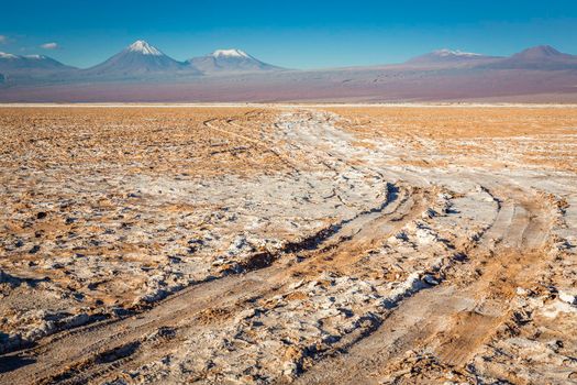 Country road in Atacama desert, volcanic arid landscape in Northern Chile border with Bolivia, South America