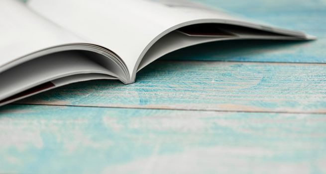 Stack magazines on wooden table