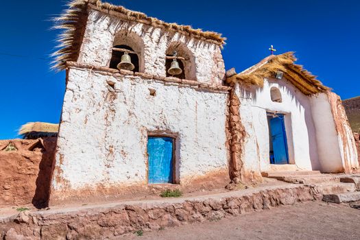 Adobe Chapel in El Tatio Machuca in Atacama desert altiplano, Chile, South America