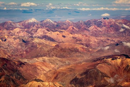 Andes cordillera and Atacama aerial view, dramatic landscapes with exotic volcanoes, Chile, Argentina and Bolivia borders, South America