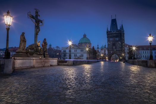 Charles bridge illuminated at night, Prague old town, Czech Republic