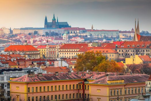Above medieval Prague old town towers and domes at evening, Czech Republic