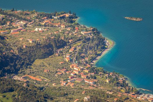 Above idyllic and turquoise Lake Garda from Monte Baldo, Malcesine, Northern Italy
