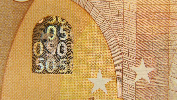 Part of a 50 euro paper bill. Macro photo. Cash. Finance. Without lighting.