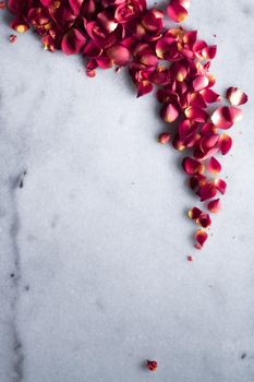 rose petals on marble flatlay - wedding, holiday and floral background styled concept, elegant visuals