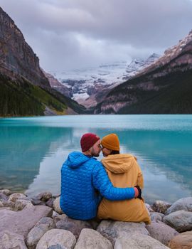 Lake Louise Canadian Rockies Banff national park, of iconic Lake Louise in Banff National Park in the Rocky Mountains of Alberta Canada. Romantic lovely couple men and women by the lake