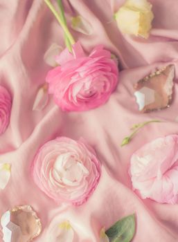 pink rose flowers on soft silk - wedding, holiday and floral background styled concept, elegant visuals