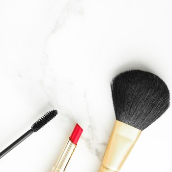 Make-up and cosmetics on marble, flatlay - modern feminine lifestyle, vlog background and styled stock concept. Beauty inspiration in a fashion blog