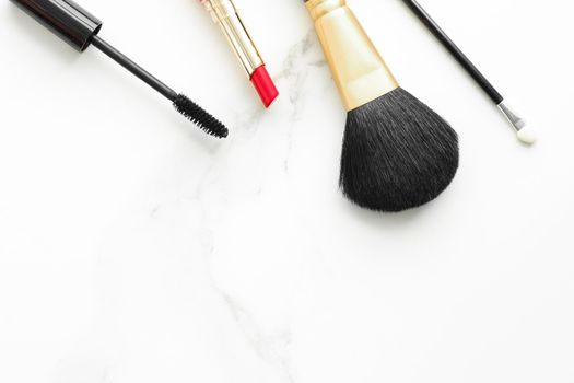 Make-up and cosmetics on marble, flatlay - modern feminine lifestyle, vlog background and styled stock concept. Beauty inspiration in a fashion blog