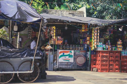 A small street food stall on the corner of a road. Kolkata India South Asia 17 August 2022