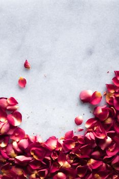 rose petals on marble flatlay - wedding, holiday and floral background styled concept, elegant visuals