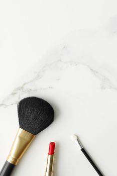 Make-up and cosmetics on marble, flatlay - modern feminine lifestyle, vlog background and styled stock concept. Beauty inspiration in a fashion blog