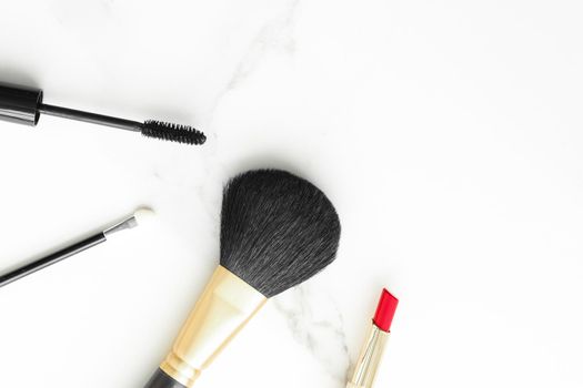 Make-up and cosmetics on marble, flatlay - modern feminine lifestyle, vlog background and styled stock concept. Beauty inspiration in a fashion blog