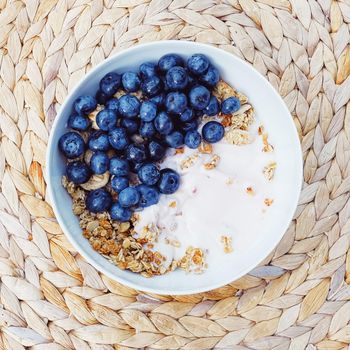 Blueberry yogurt cereal bowl as healthy breakfast and morning meal, sweet food and organic berry fruit, diet and nutrition concept