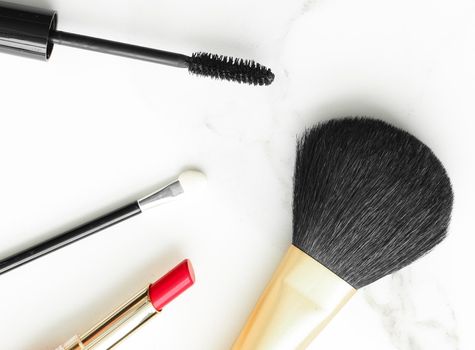 Make-up and cosmetics on marble, flatlay - modern feminine lifestyle, vlog background and styled stock concept. Beauty inspiration in a fashion blog