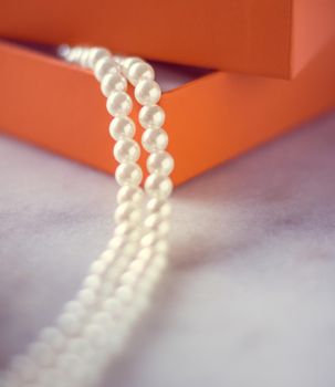 Chic pearl jewellery in a present box - Valentine's day ideas, luxury shopping and holiday inspiration concept. The perfect gift for her