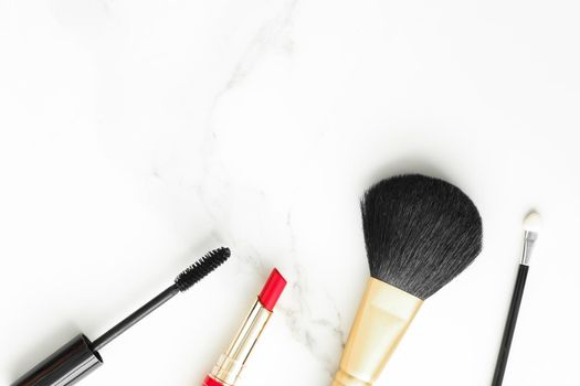 Make-up and cosmetics on marble, flatlay - modern feminine lifestyle, vlog background and styled stock concept. Beauty inspiration in a fashion blog