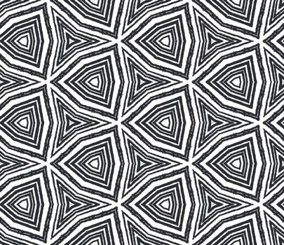 Geometric seamless pattern. Black symmetrical kaleidoscope background. Hand drawn geometric seamless design. Textile ready wonderful print, swimwear fabric, wallpaper, wrapping.