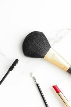 Make-up and cosmetics on marble, flatlay - modern feminine lifestyle, vlog background and styled stock concept. Beauty inspiration in a fashion blog