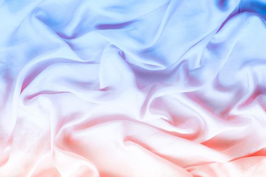 Neon soft silk waves, flatlay - elegant fabric textures, abstract backgrounds and modern pastel colours concept. Feel the sense of timeless luxury