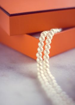 Chic pearl jewellery in a present box - Valentine's day ideas, luxury shopping and holiday inspiration concept. The perfect gift for her