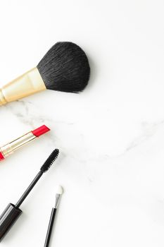 Make-up and cosmetics on marble, flatlay - modern feminine lifestyle, vlog background and styled stock concept. Beauty inspiration in a fashion blog