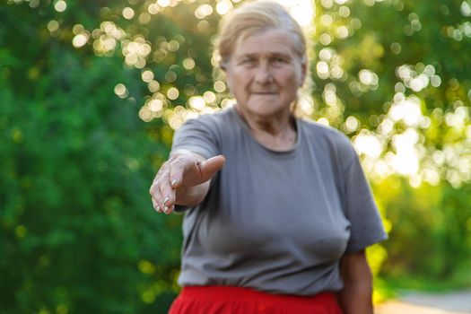 grandmother lends a helping hand. Selective focus. people.