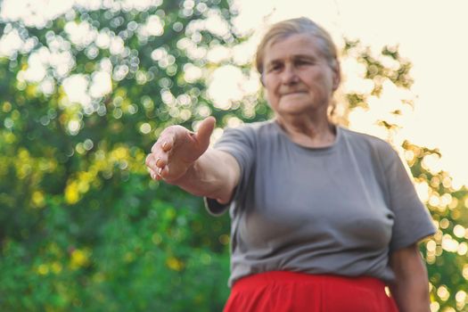 grandmother lends a helping hand. Selective focus. people.