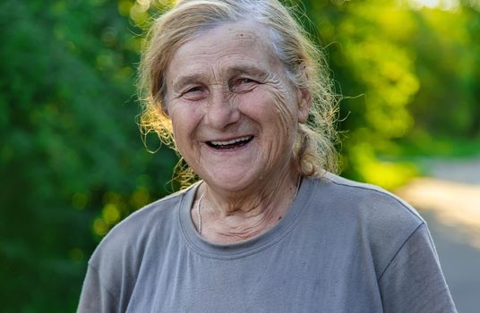 grandmother portrait of an old woman. Selective focus. People.