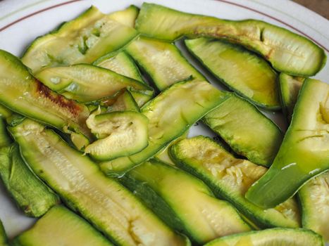 zucchini aka courgettes vegetables vegetarian food in a dish