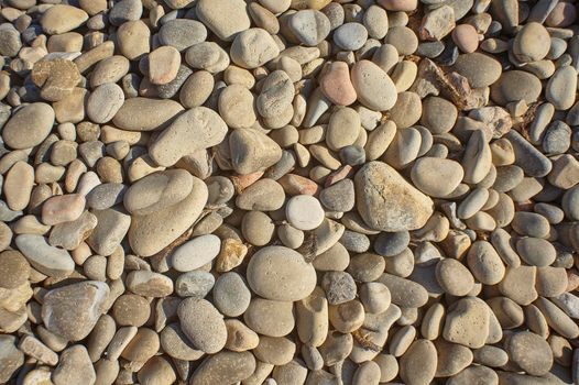 Texture of white stones typical of alcne beaches of southern Sardinia at very high resolution.