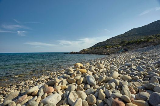 Magnificent view of Punta Molentis beach In Sardinia, taken during the summer: A completely uncontaminated and natural Mediterranean pebble beach.