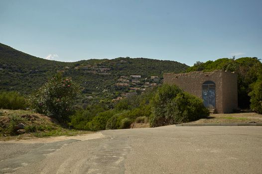 Panorama that showing the upper part of the village of Costa Rei seen from one of the streets that cross the village.
