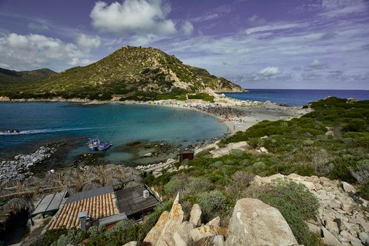 A corner of paradise: Punta Molentis beach immersed in the typical colors of Sardinian beaches on a summer day.