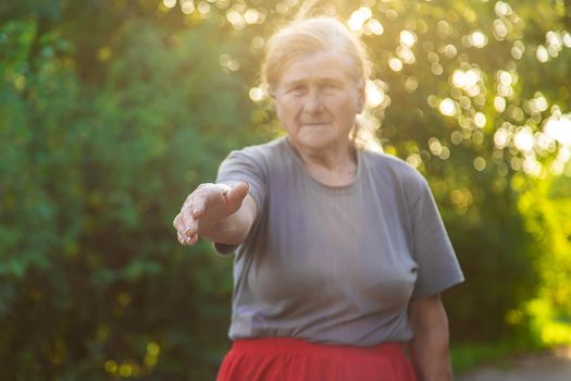 grandmother lends a helping hand. Selective focus. people.