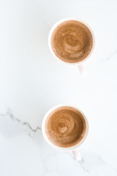 Breakfast, drinks and modern lifestyle concept - Hot aromatic coffee on marble, flatlay