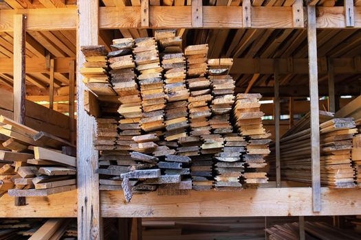 Folded finished boards at the sawmill close up
