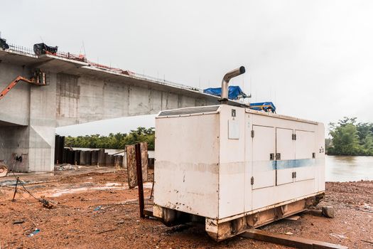 Electricity generating plant at a bridge construction site in the caribbean of Nicaragua