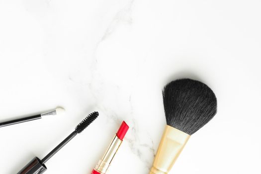 Make-up and cosmetics on marble, flatlay - modern feminine lifestyle, vlog background and styled stock concept. Beauty inspiration in a fashion blog