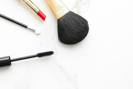 Make-up and cosmetics on marble, flatlay - modern feminine lifestyle, vlog background and styled stock concept. Beauty inspiration in a fashion blog