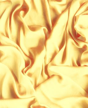 Luxury golden silk background texture - elegant fabric textures, abstract backgrounds and modern pastel colours concept