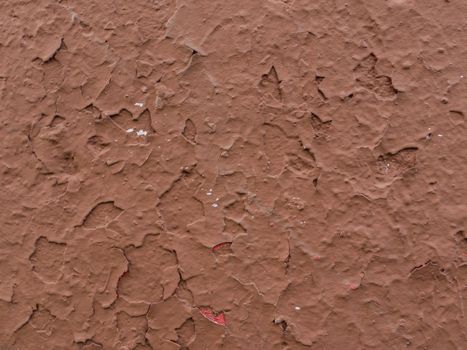 Plastered Concrete Wall. Abstract texture for design from old brown plaster. Old shabby surface,