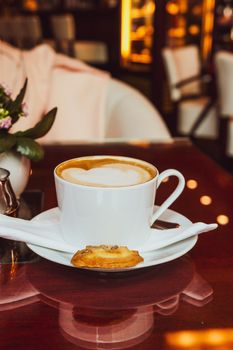 Breakfast, food and drinks and service concept - Cappuccino in a restaurant, at a coffee break