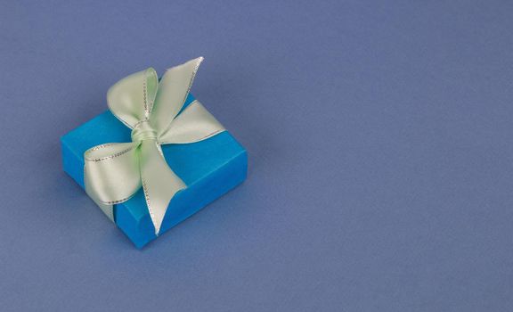 A festive concert. A gift box with a beautiful bow.